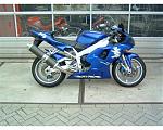 Click image for larger version

Name:	Yamaha%20YZF%20R1%202003%2001.jpg
Views:	290
Size:	155.1 KB
ID:	940083